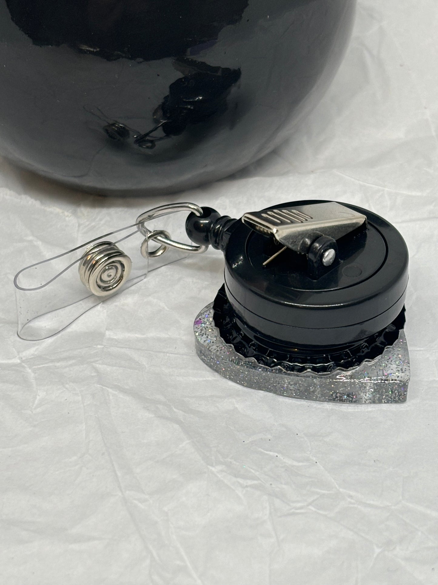 Planchette Badge Reel