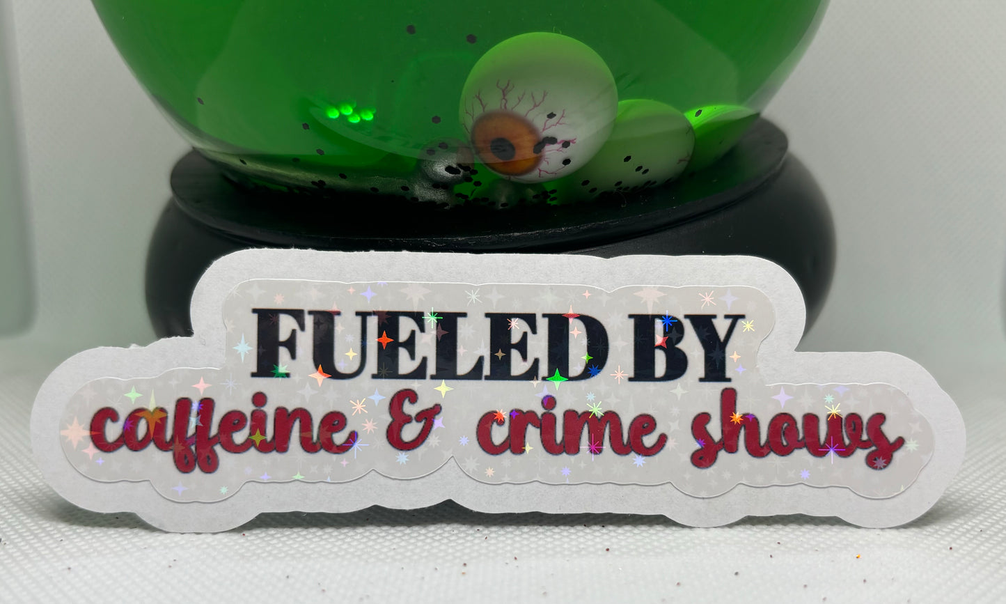 Fueled By Caffeine & Crime Shows Sticker